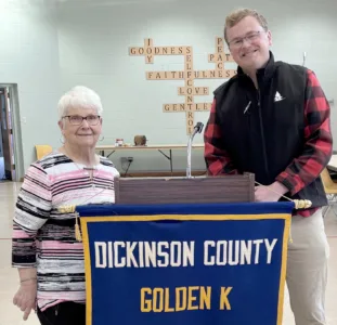Golden K hears history of Bay Cliff Health Camp